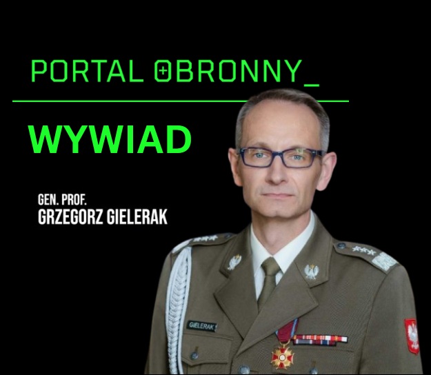 Na pierwszym planie Grzegorz Gielerak, w tle napis 