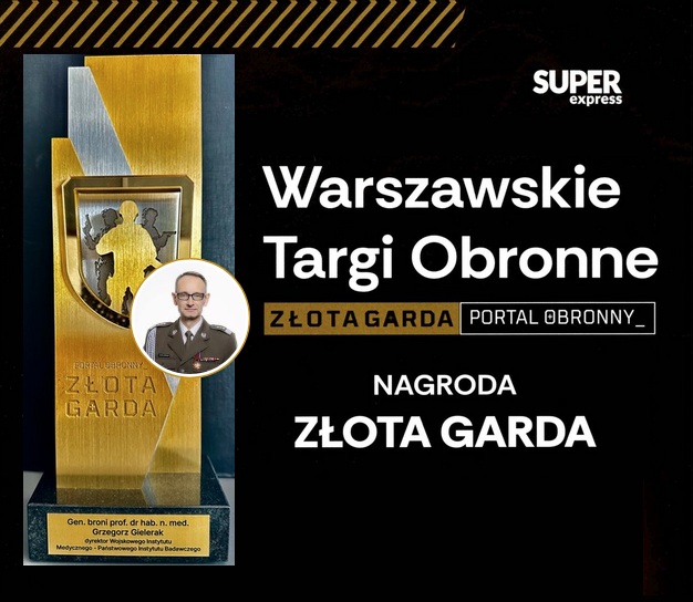 Złota statuetka nagrody złote gardy przedstawiająca sylwetkę żołnierza z bronią. W kółku Grzegorz Gielerak.
